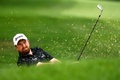 世界ゴルフ選手権第3戦、ブリヂストン・インビテーショナル最終日。11番でバンカーショットを打つシェーン・ローリー（2015年8月9日撮影）。(c)AFP/Getty Images/Richard Heathcote