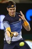 全豪オープンテニス、男子シングルス準々決勝。リターンを打つミロス・ラオニッチ（2016年1月27日撮影）。(c)AFP/PAUL CROCK