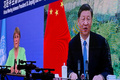 中国・広州で、習近平・中国国家主席とオンラインで会談するミチェル・バチェレ国連人権高等弁務官（左）を映した画面。国連人権高等弁務官事務所（OHCHR）提供（2022年5月25日撮影、公開）。(c)AFP PHOTO /  Office of the United Nations High Commissioner for Human Rights (OHCHR)