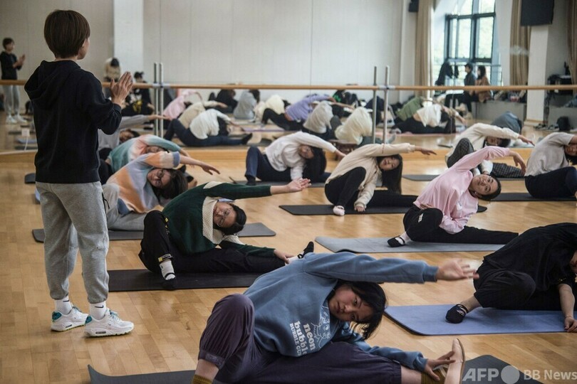 中国の元エリート選手が指導、若年層の体力向上を政府奨励