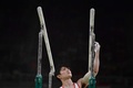 リオデジャネイロ五輪、体操男子予選。平行棒の演技に臨む内村航平（2016年8月6日撮影）。(c)AFP/Ben STANSALL