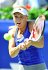 女子テニス、韓国オープン（KDB Korea Open 2012）は22日、韓国のソウル（Seoul）で行われ、大会第1シードのカロリーネ・ボズニアツキ（Caroline Wozniacki、デンマーク）は6-1、6-0で第3シードのカイア・カネピ（Kaia Kanepi）を下し、優勝を飾った。

リターンを狙うカロリーネ・ボズニアツキ（2012年9月22日撮影）。(c)AFP/JUNG YEON-JE