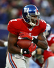 ボールを運ぶジャイアンツのブランドン・ジェイコブス（%%Brandon Jacobs%%）。(c)AFP/Getty Images Al Bello