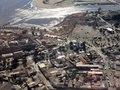 地震により被害を受けたチリ・トンゴイの街を写した空撮写真。同国空軍提供（2015年9月17日提供）。(c)AFP/FUERZA AEREA CHILENA