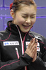 世界フィギュアスケート選手権（ISU World Figure Skating Championships 2013）は16日、カナダ・オンタリオ（Ontario）州ロンドン（London）のバドワイザー・ガーデンズ（Budweiser Gardens）で女子シングル・フリースケーティング（FS）が行われ、韓国の金妍児（Yu-Na Kim、キム・ヨナ）が合計218.31点で優勝を飾った。

キスアンドクライで手を合わせる村上佳菜子（Kanako Murakami、2013年3月16日撮影）。(c)AFP/Brendan SMIALOWSKI