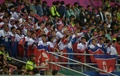 第17回アジア競技大会（17th Asian Games、Asiad）サッカー男子決勝、韓国対北朝鮮。声援を送る北朝鮮の応援団（2014年10月2日撮影）。(c)AFP/PORNCHAI KITTIWONGSAKUL