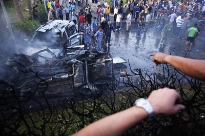 国連調査委、カダフィ政権の戦争犯罪を非難 石油相は反体制派に