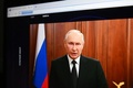 ロシア・モスクワで演説するウラジーミル・プーチン大統領の映像（2023年6月24日撮影）。(c)Natalia KOLESNIKOVA / AFP