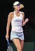 女子テニス、WTAツアー選手権（BNP Paribas WTA Championships - Singapore 2014）4日目。ガッツポーズをみせるマリア・シャラポワ（Maria Sharapova、2014年10月23日撮影）。(c)AFP/ROSLAN RAHMAN