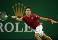 男子テニス、上海マスターズ（2014 Shanghai Rolex Masters）シングルス準決勝。リターンを狙うノバク・ジョコビッチ（Novak Djokovic、2014年10月11日撮影）。(c)AFP/GOH CHAI HIN