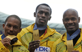 第12回世界陸上ベルリン大会（%%12th IAAF World Championships in Athletics Berlin%%）男子4×100メートルリレー決勝。ジャマイカが37秒31の大会新記録で優勝した。37秒62でトリニダード・トバゴが2位に、38秒02で英国が3位に入った。日本は38秒30で4位に入り、惜しくもメダル獲得を逃した。

　ウサイン・ボルト（%%Usain Bolt%%）は、第3走者としてジャマイカの金メダル獲得に貢献し、%%北京五輪%%に続き世界選手権でも短距離（100メートル、200メートル、4×100メートルリレー）3冠に輝いた。写真は表彰台でポーズをとるジャマイカの（左から）マイケル・フレイター（%%Michael Frater%%）、ウサイン・ボルト、アサファ・パウエル（%%Asafa Powell%%）。（2009年8月23日撮影）(c)AFP/JOHN MACDOUGALL