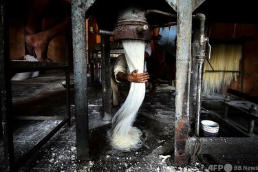 今日の1枚】髪結いのように優しく仕上げる伝統食材 インド 写真4枚 国際ニュース：AFPBB News