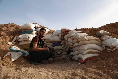 シリア首都近郊、反体制派内の衝突で52人死亡 監視団発表