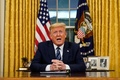 米首都ワシントンのホワイトハウス大統領執務室で、国民に向けた演説を行うドナルド・トランプ米大統領（2020年3月11日撮影）。(c)Doug Mills / POOL / AFP 