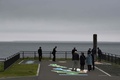 北海道根室市の納沙布岬を訪れた観光客（2018年10月11日撮影）。(c)Kazuhiro NOGI / AFP