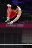ロンドン五輪は28日、ノース・グリニッジ・アリーナ（North Greenwich Arena）で体操の男子予選が行われ、日本はミスを連発しながらも全体5位で団体決勝に進出した。

鉄棒の演技に臨む山室光史（Koji Yamamuro、2012年7月28日撮影）。(c)AFP/BEN STANSALL