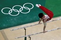 リオデジャネイロ五輪、体操男子予選。平行棒の演技に臨む内村航平（2016年8月6日撮影）。(c)AFP/Antonin THUILLIER