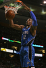 08-09NBA東カンファレンスプレーオフ準決勝、ボストン・セルティックス（%%Boston Celtics%%）対オーランド・マジック（%%Orlando Magic%%）第7戦。試合はマジックが101-82でセルティックスを下し、対戦成績を4勝3敗としてカンファレンス決勝に進出した。写真はダンクシュートを決めるマジックのドワイト・ハワード（%%Dwight Howard%%）。（2009年5月17日撮影）(c)AFP/Getty Images/Elsa