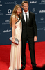 ローレウス・ワールド・スポーツ・アワード（%%2010 Laureus World Sports Awards%%）の授賞式が10日、アラブ首長国連邦のアブダビ（Abu Dhabi）で開催され、男子年間最優秀選手には陸上競技のウサイン・ボルト（%%Usain Bolt%%、ジャマイカ）、女子年間最優秀選手にはテニスのセレーナ・ウィリアムス（%%Serena Williams%%、米国）が選出された。ボルトの受賞は2年連続2度目。

　写真はブレークスルー賞に選出されたF1ドライバーのジェンソン・バトン（%%Jenson Button%%）、左は恋人の道端ジェシカ（%%Jessica Michibata%%）。（2010年3月10日撮影）(c)AFP/MARWAN NAAMANI