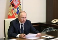 ロシア・モスクワ近郊の公邸からビデオ通話で会議に出席するウラジーミル・プーチン大統領（2022年8月24日撮影）。(c)Mikhail Klimentyev / Sputnik / AFP