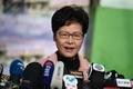 香港で、区議会議員選の投票を終えて記者会見する林鄭月娥（キャリー・ラム）行政長官（2019年11月24日撮影）。(c)Ye Aung Thu / AFP