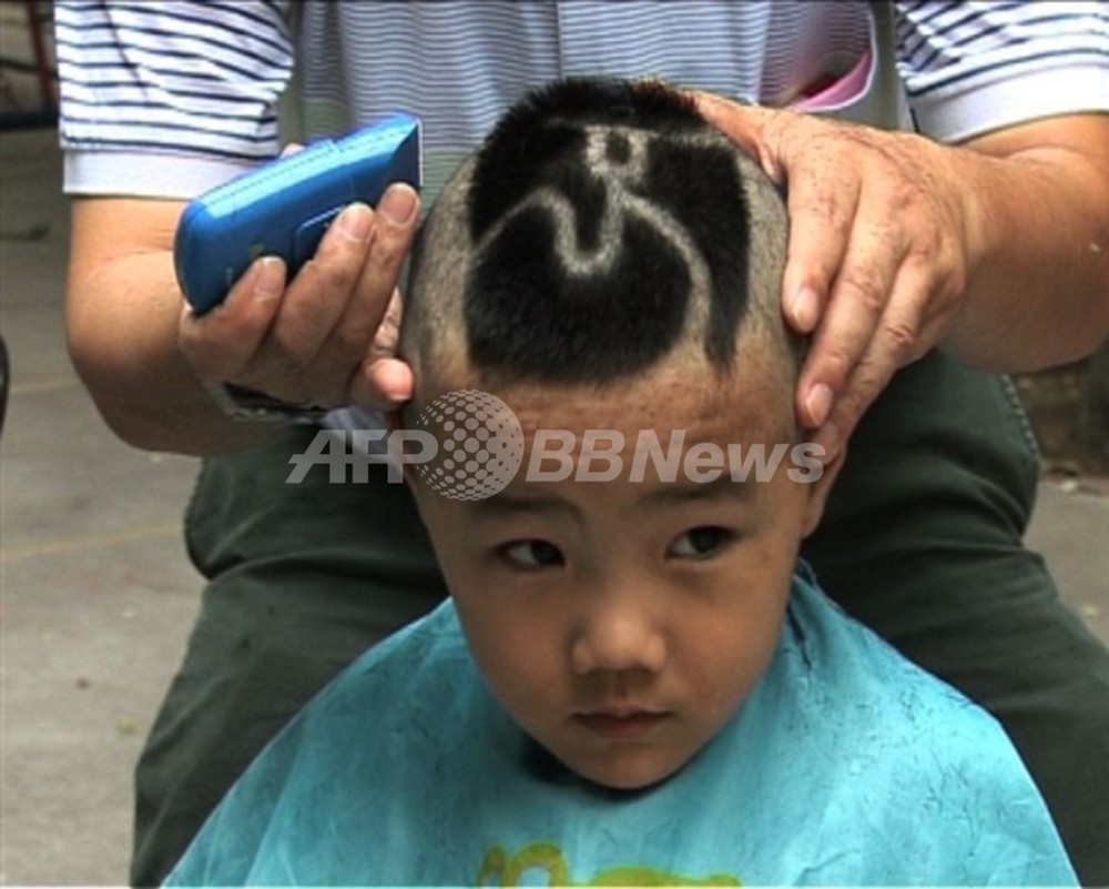 動画 北京市民 五輪フィーバーで髪型を 五輪カット に 写真1枚 国際ニュース Afpbb News