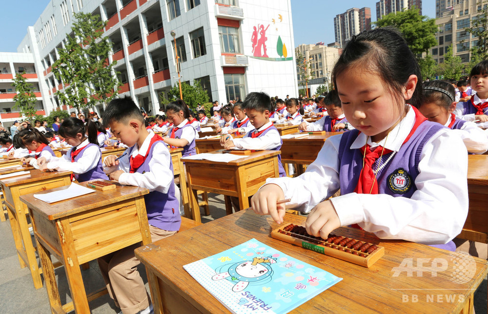 そろばんの暗算を小学校の学課に導入 中国・江蘇 写真5枚 国際ニュース：AFPBB News