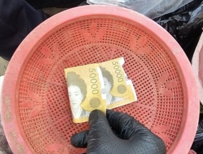 韓国・驚くほどズサンなニセ札…表裏に同じ肖像画