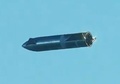 米テキサス州ボカチカで、米宇宙開発企業スペースXが行った巨大宇宙船「スターシップ」の高高度飛行試験で、エンジン停止後に安定した体勢で降下する試験機「SN8」。スペースXが撮影・公開した動画より（2020年12月9日撮影）。(c)AFP PHOTO / SPACE X 
