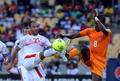 サッカー2013アフリカネイションズカップ（2013 The Africa Cup of Nations）は26日、グループDの2試合が行われ、コートジボワールは3-0でチュニジアを下した。

ボールを競るチュニジアのハレド・ムイルヒ（Khaled Mouelhi、左）とコートジボワールのサロモン・カルー（Salomon Kalou、2013年1月26日撮影）。(c)AFP/ALEXANDER JOE