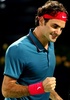 ドバイ・テニス選手権（Dubai Duty Free Tennis Championships 2014）、男子シングルス決勝。ポイントを奪い、ガッツポーズを見せるロジャー・フェデラー（Roger Federer、2014年3月1日撮影）。(c)AFP/MARWAN NAAMANI