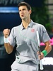ドバイ・テニス選手権（Dubai Duty Free Tennis Championships 2014）、男子シングルス準決勝。第1セットを制し喜ぶノバク・ジョコビッチ（Novak Djokovic、2014年2月28日撮影）。(c)AFP/MARWAN NAAMANI