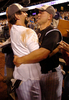 ナ・リーグ地区シリーズ進出を果たし歓喜するロッキーズのトッド・ヘルトン（%%Todd Helton%%、左）とホリデイ。(c)AFP/Getty Images Steve Dykes