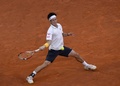 テニス、マドリード・オープン（Mutua Madrid Open 2014）男子シングルス決勝。リターンを打つ錦織圭（Kei Nishikori、2014年5月11日撮影）。(c)AFP/DANI POZO