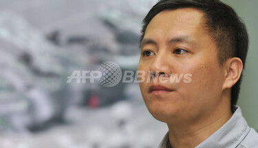 天安門事件から4日で20年、元学生リーダー王丹氏が心境を吐露 写真5枚