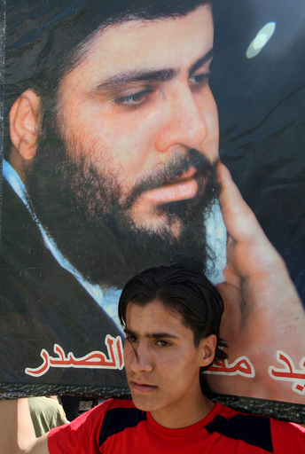 バグダッドで武力衝突、市民4人含む20人死亡