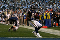 写真は、第4QにTDを決めるトムリンソン。(c)AFP/Getty Images Harry How