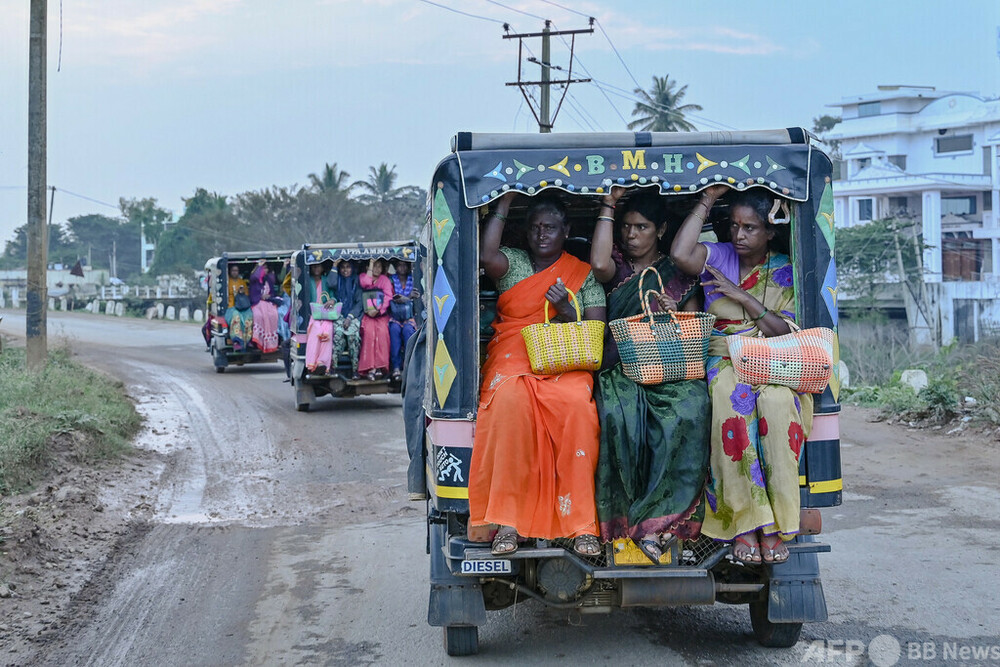 【今日の1枚】オートリキシャで家路に、インド・ベンガルール 写真1枚 国際ニュース：AFPBB News