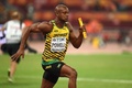 第15回世界陸上北京大会、男子4×100メートルリレー決勝にジャマイカの第2走者として臨むアサファ・パウエル（2015年8月29日撮影）。(c)AFP/JOHANNES EISELE