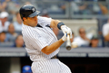 米大リーグ（MLB）、ニューヨーク・ヤンキース（New York Yankees）の黒田博樹（Hiroki Kuroda）は18日、トロント・ブルージェイズ（Toronto Blue Jays）戦に先発登板し、7回を投げ4安打無失点、5奪三振で今季9勝目を挙げた。

試合は7回に雨天コールドとなり、ヤンキースが6-0で勝利した。

3回に安打を放つニューヨーク・ヤンキースのマーク・テシェーラ（Mark Teixeira、2012年7月18日撮影）。(c)AFP/Getty Images/Jim McIsaac