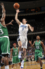 09-10NBA、オーランド・マジック（%%Orlando Magic%%）対ボストン・セルティックス（%%Boston Celtics%%）。試合はセルティックスが86-77で勝利した。写真は得点を狙うマジックのJJ・レディック（%%JJ Redick%%）。（2009年12月25日撮影）(c)AFP/Getty Images/NBAE/Fernando Medina