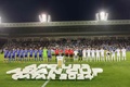 サッカーU-23アジアカップ決勝、日本対ウズベキスタン。試合前の国歌斉唱の様子（2024年5月3日撮影）。(c)KARIM JAAFAR / AFP