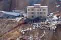 救助活動が続く土砂崩れの現場（2019年3月17日撮影）。(c)CNS/韋亮