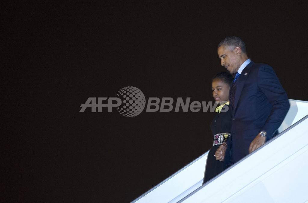 オバマ大統領がセネガル到着、 アフリカ3か国を歴訪 オバマ大統領がセネガル到着、 アフリカ3か国を歴訪
