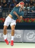 ドバイ・テニス選手権（Dubai Duty Free Tennis Championships 2014）、男子シングルス準決勝。サーブを打つロジャー・フェデラー（Roger Federer、2014年2月28日撮影）。(c)AFP/MARWAN NAAMANI