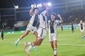 サッカーU-17W杯決勝、ドイツ対フランス。得点を喜ぶドイツの（左から）エリック・ダシウバ・モレイラ、パリス・ブルナー、ノア・ダルビッチ（2023年12月2日撮影）。(c)Adek BERRY/AFP