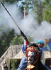 モロッコの首都ラバト（Rabat）で、伝統の騎馬戦術を再現する祭り「ファンタジア（Fantasia）」が開催された。写真は馬に乗る女性の参加者（2009年7月9日撮影）。(c)AFP/FADEL