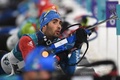平昌冬季五輪、バイアスロン男子20キロ個人の射撃に臨むマルタン・フールカデ（2018年2月15日撮影）。(c)AFP PHOTO / Christof STACHE