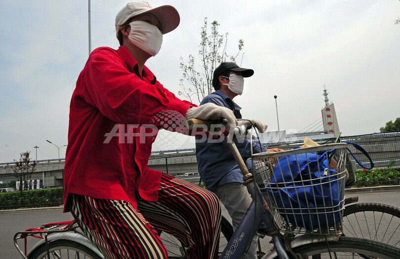 五輪控え、北京市内企業に就業時間短縮令