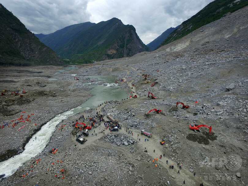 中国土砂崩れ、捜索活動中断 二次災害の恐れ